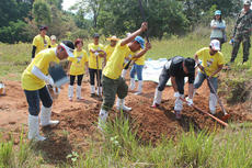 YTMT employees dig trenches as a first step in “Salt Earth Making”