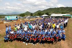 Participants in first-phase tree planting at Tire Test Center of Asia