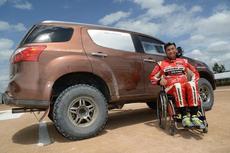 Takuma Aoki and his racing car