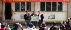 Yokohama Rubber (China) Chairman and President Shigetoshi Kondo (left) attends the opening ceremony of the Sales Platform of Ecological Agricultural & Forestry Product in Heyuan Village