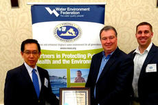 YTMV President Tetsuro Murakami, Director of Environmental Health and Safety Neil Dalton and EHS staff member Christian Yates (left to right) proudly pose with the Environmental Warrior Award