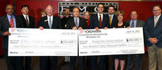 YTMM President Tadaharu Yamamoto (center) presents donations at presentation ceremony at East Mississippi Community College on 13 May