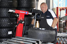 YOKOHAMA Motorsports Team member mounting the race tyres photo Paulo Maria DPPI