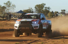 TRD’s Toyota Hilux racing across the desert sand